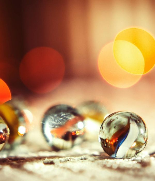 Abstract orange glowing sphere representing internal focus and balance